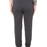 Back view of a female model wearing the women's summer night charcoal joggers. 