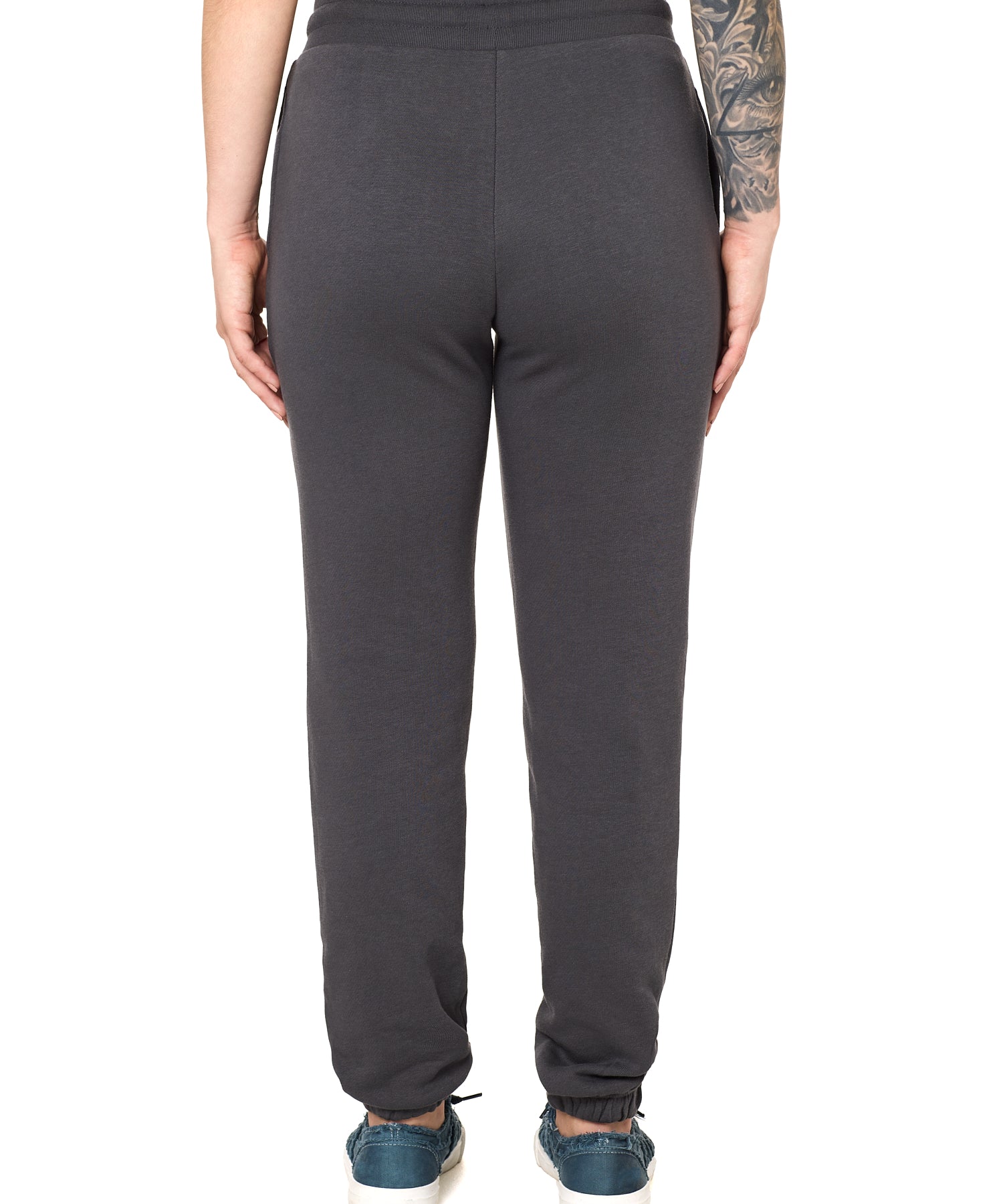 Back view of a female model wearing the women's summer night charcoal joggers. 