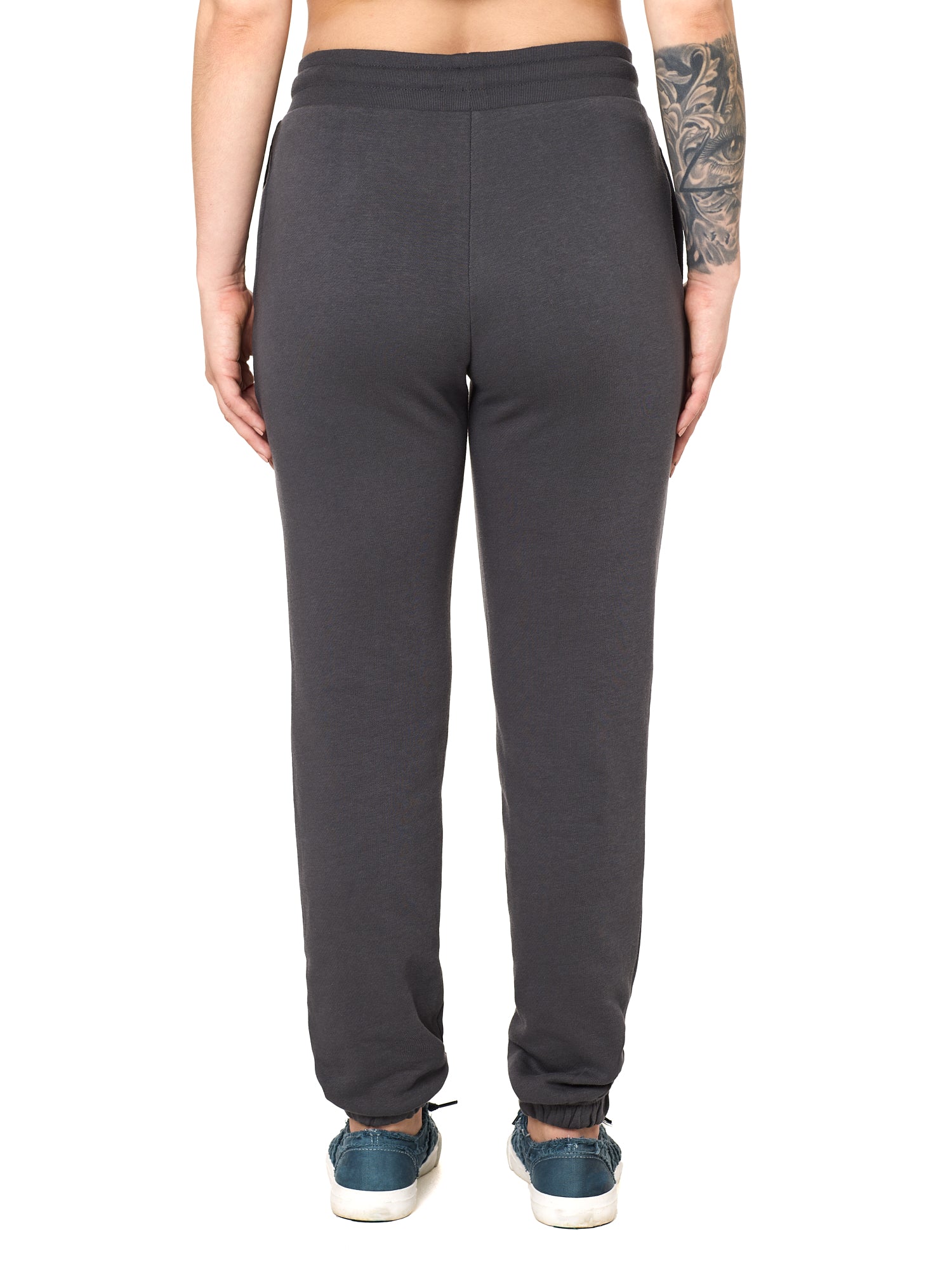 Back view of a female model wearing the women's summer night charcoal joggers. 