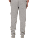 Back view of a male model wearing the Men's summer night heather gray joggers.  Featuring a back pocket on the wearers right.