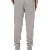 Back view of a male model wearing the Men's summer night heather gray joggers.  Featuring a back pocket on the wearers right.