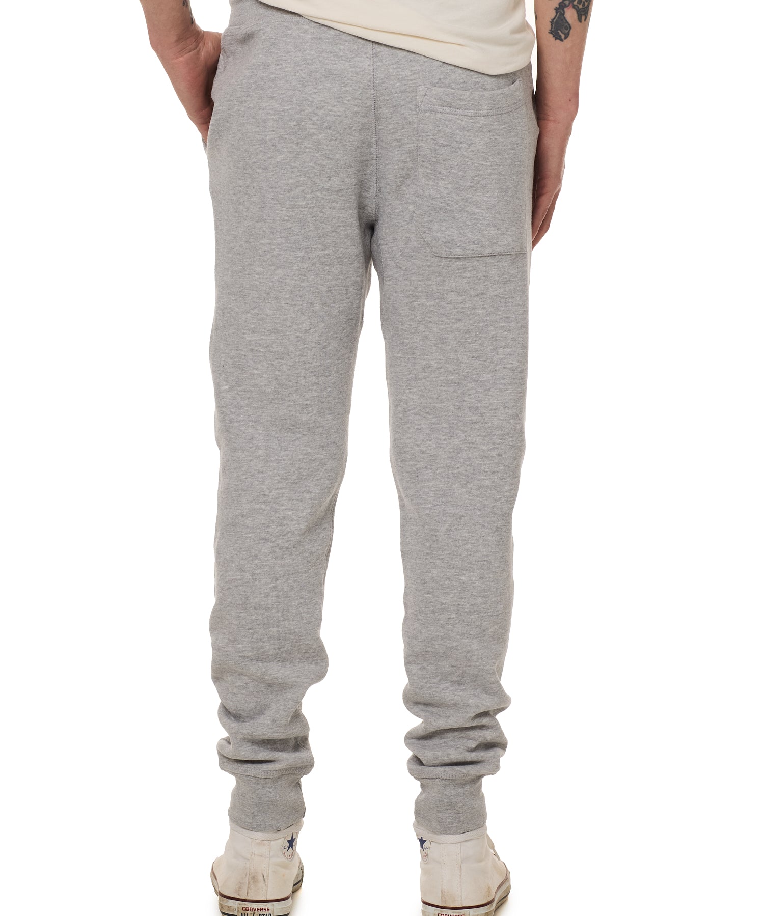 Back view of a male model wearing the Men's summer night heather gray joggers.  Featuring a back pocket on the wearers right.