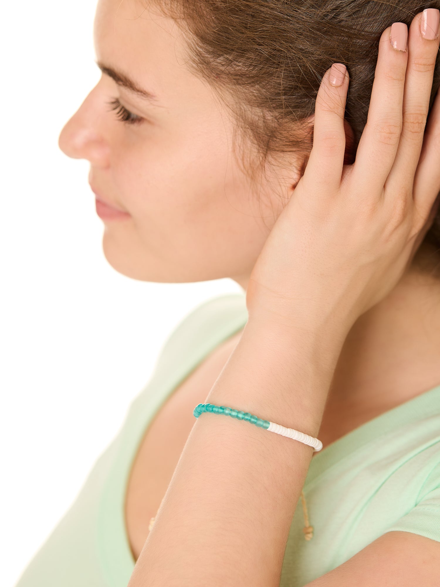 close up view of a female model wearing the Turquoise Surf and Sand bracelet