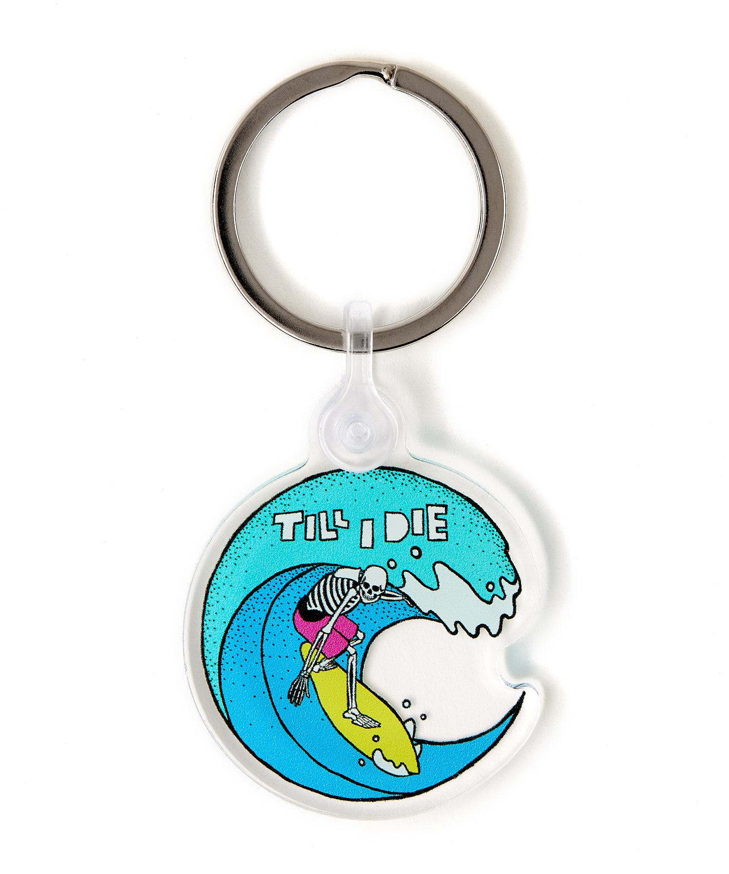 Front view of the Surfer Skeleton clear acrylic keychain, featuring a multicolored circular graphic of a skeleton surfing a wave, with “Till I Die” text at the top. The transparent acrylic enhances the vividness of the design.