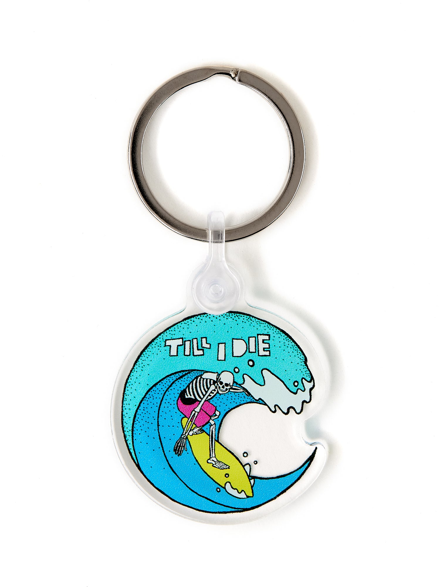 Front view of the Surfer Skeleton clear acrylic keychain, featuring a multicolored circular graphic of a skeleton surfing a wave, with “Till I Die” text at the top. The transparent acrylic enhances the vividness of the design.