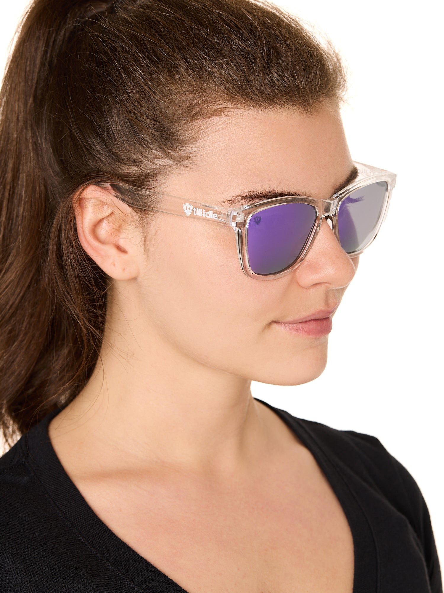 front view of a female model wearing the violet haze sunglasses on a white background