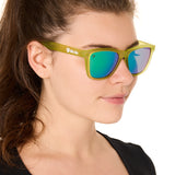 front view of a female model wearing the electric jungle sunglasses on a white background