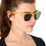 front view of a female model wearing the mango mermaid sunglasses on a white background
