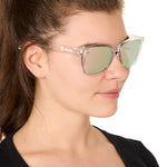 front view of a male model wearing the rosewater reflection sunglasses on a white background