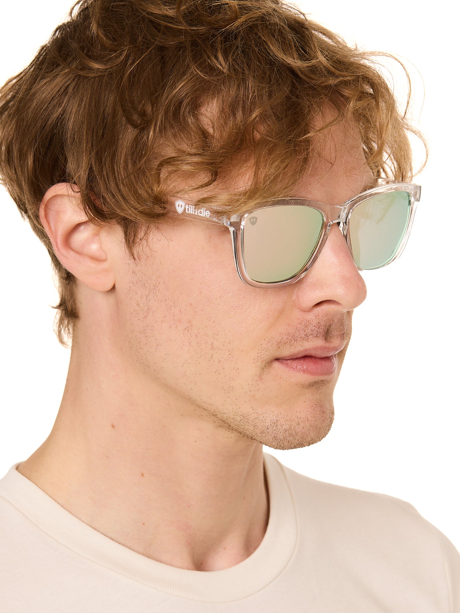 front view of a male model wearing the rosewater reflection sunglasses on a white background