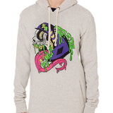 Front view of a female model wearing the Steezy Stan Hoodie in Heather Oatmeal on a white background. The graphic features a multicolored zombie skier with a long tongue, dripping slime, the Double Diamond Shield bursting from its skull, and oozing "Till I Die" text in a sludge-like style.