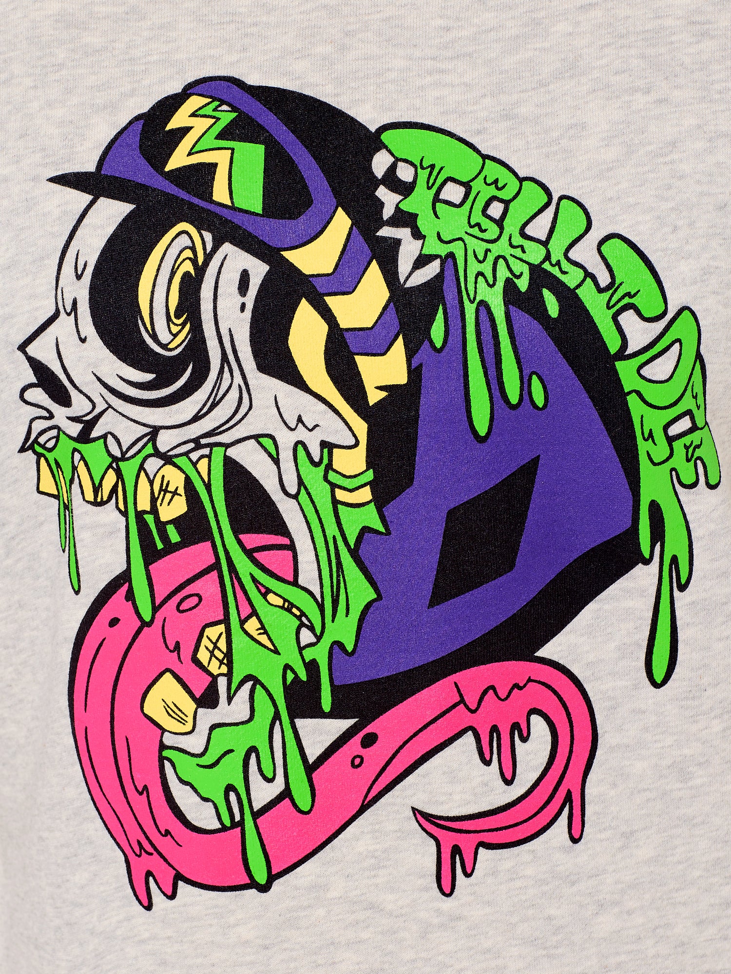 Detail view of the Steezy Stan Hoodie in Heather Oatmeal. The graphic features a multicolored zombie skier with a long tongue, dripping slime, the Double Diamond Shield bursting from its skull, and oozing "Till I Die" text in a sludge-like style.