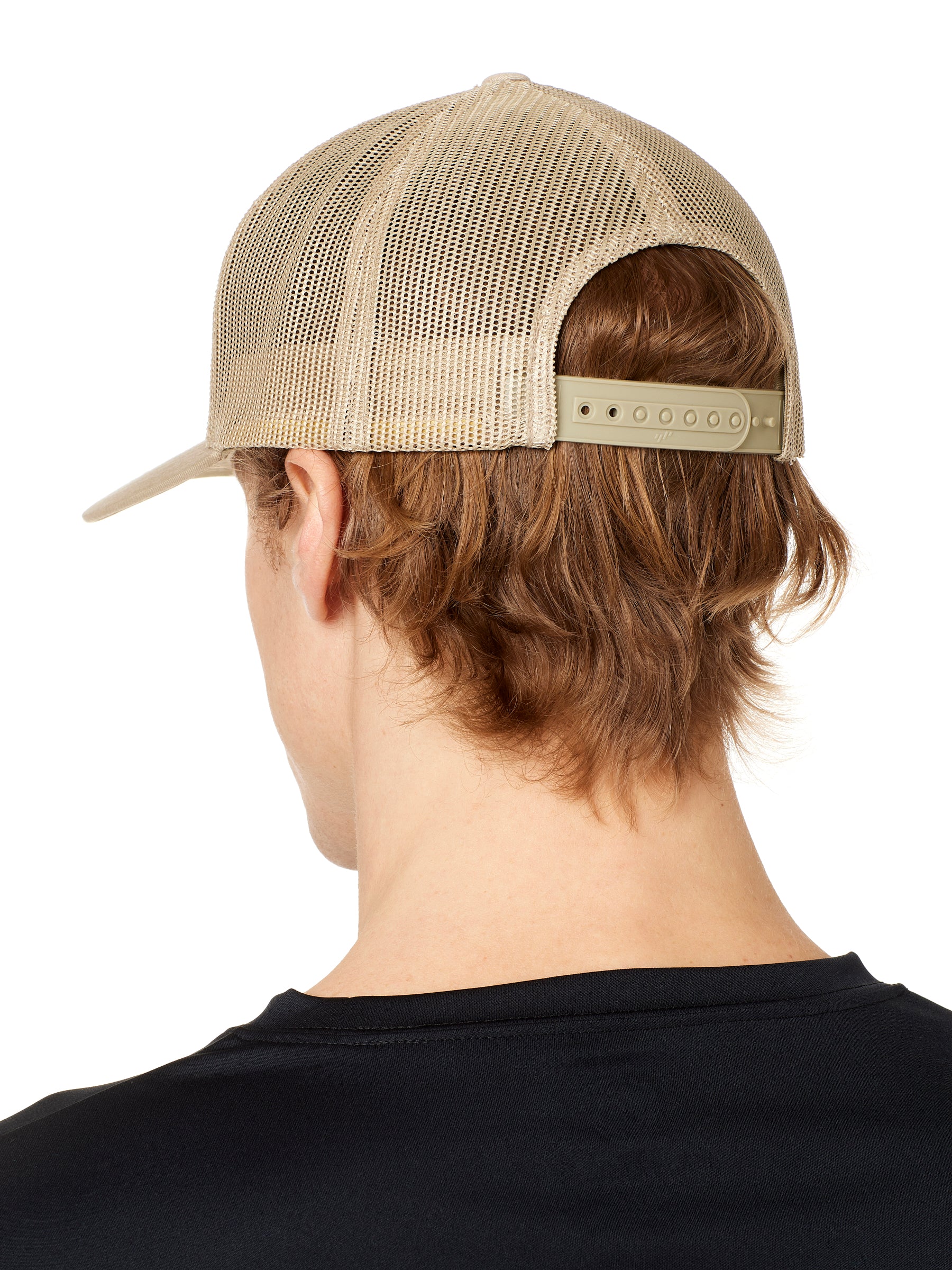 BACK OF MAN WEARING A TAN TRUCKER HAT, SHOWING THE ADJUSTABLE SNAPBACK 