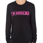 Front view of a female model wearing the "I'm Hard" Black performance long sleeve Shirt. The graphic features trail sign-inspired "I'm Hard" text with a single diamond symbol indicating advanced terrain.