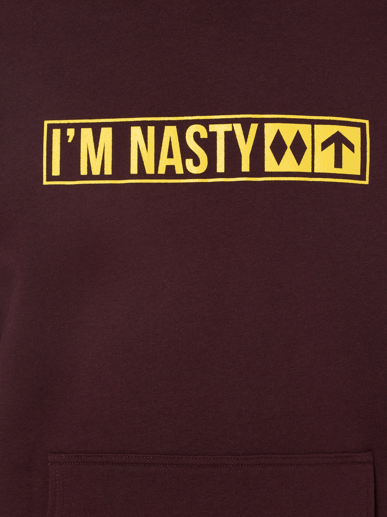 front detail of the 'I'm Nasty' hoodie in oxblood, the yellow design is in the style of a ski trail sign with the text "I'm Nasty" and two double diamonds