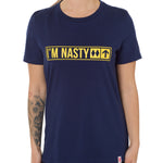 Front view of a female model wearing the "I'm Nasty" Navy Tee Shirt. The graphic features trail sign-inspired "I'm Nasty" text with a double diamond symbol indicating expert terrain.