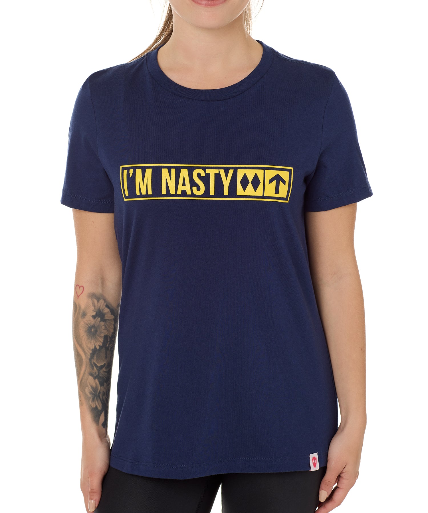 Front view of a female model wearing the "I'm Nasty" Navy Tee Shirt. The graphic features trail sign-inspired "I'm Nasty" text with a double diamond symbol indicating expert terrain.