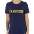 Front view of a female model wearing the "I'm Nasty" Navy Tee Shirt. The graphic features trail sign-inspired "I'm Nasty" text with a double diamond symbol indicating expert terrain.