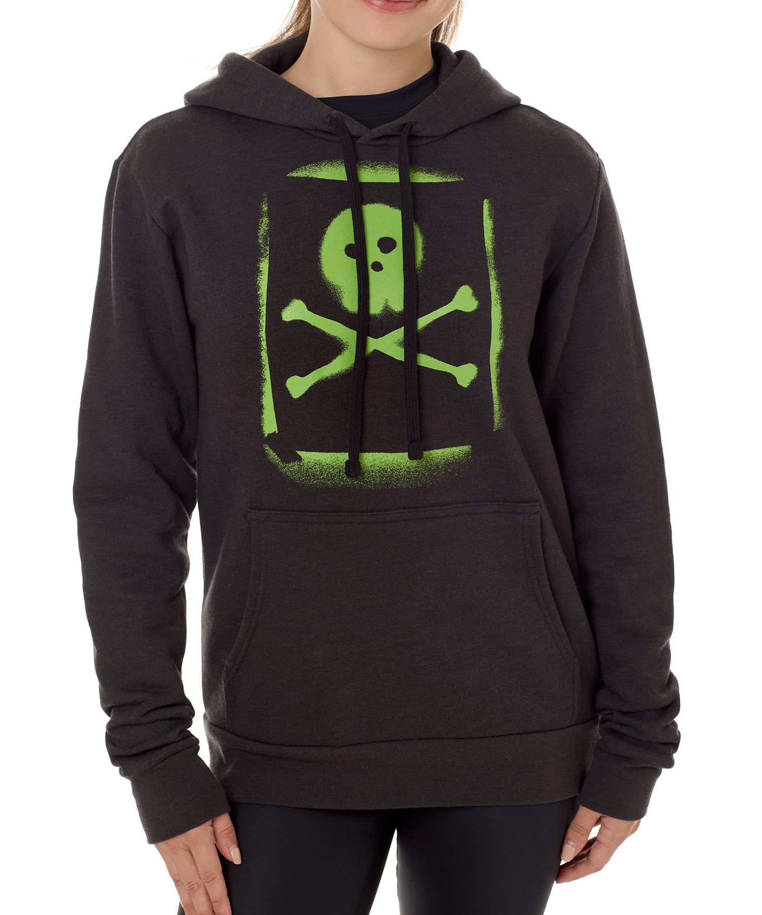 A woman wearing a black hoodie with a green skull and crossbones graphic on the front.