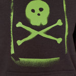 Detail of the Graffiti hoodie in Black, featuring a lime green spray painted style design of a skull and crossbones with overspray accents