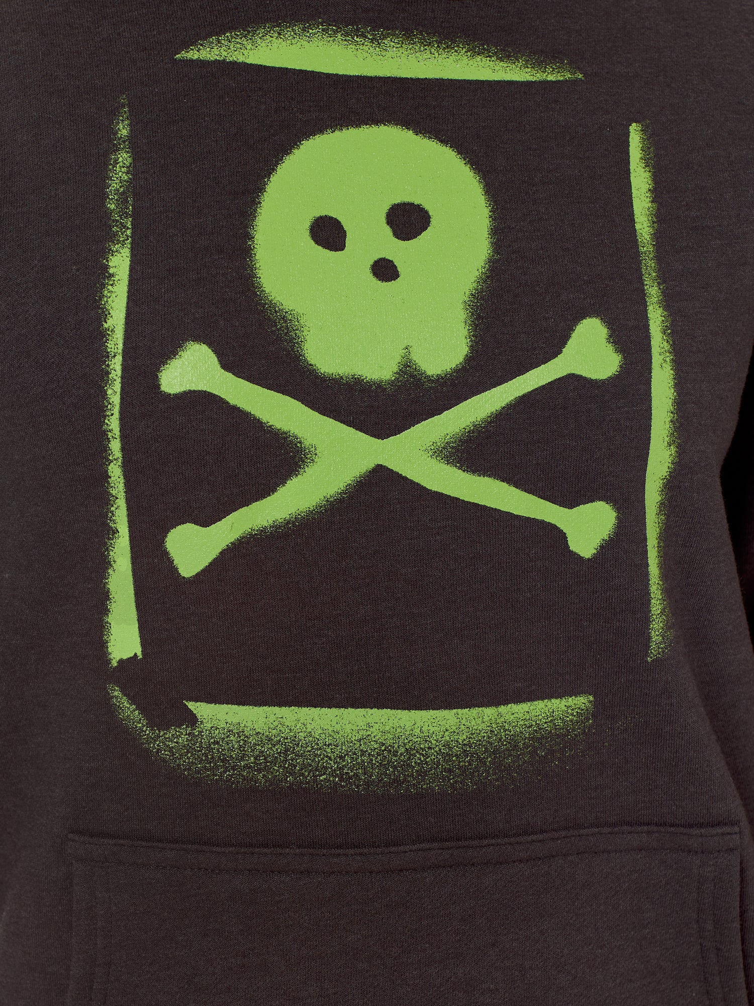 Detail of the Graffiti hoodie in Black, featuring a lime green spray painted style design of a skull and crossbones with overspray accents