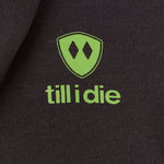 Detail of the lime green till i die logo on a Graphite Black Hoodie