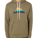 A man wearing a green hoodie with a mountain and sunset design and the text 'DO WHAT YOU LOVE. DO IT FOREVER.' on the front.