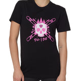Front view of a female model wearing the ULLR black crew neck tee on a white background. The pink and white graphic features a skull over crossed skis, with snowflakes, pine trees, and “Till I Die” text layered below.