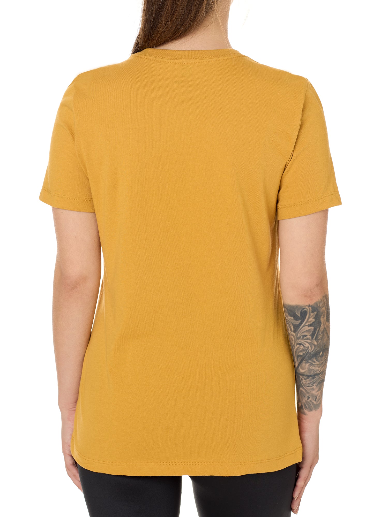 Back view of a female model wearing a mustard tee shirt on a white background