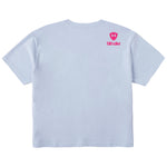 A light blue short sleeve crop tee shirt shown from the back, featuring the double diamond shield logo and the text 'till i die' on the upper right shoulder, set against a plain white background.