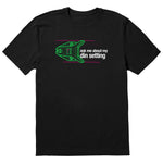 Black short sleeve T-shirt featuring a neon green technical illustration of a ski binding with hot pink accents and a DIN setting cranked to 11, alongside bold white text reading, “Ask me about my DIN setting.”