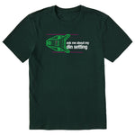 Dark green short sleeve T-shirt featuring a neon green technical illustration of a ski binding with hot pink accents and a DIN setting cranked to 11, alongside bold white text reading, “Ask me about my DIN setting.”
