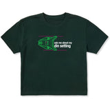 Dark Green short sleeve crop T-shirt featuring a neon green technical illustration of a ski binding with hot pink accents and a DIN setting cranked to 11, alongside bold white text reading, “Ask me about my DIN setting.”