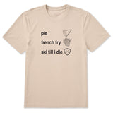 Cream T-shirt featuring black text and hand-drawn icons celebrating three mountain essentials: pie, French fries, and “Ski Till I Die,” finished with the signature Double Diamond shield.