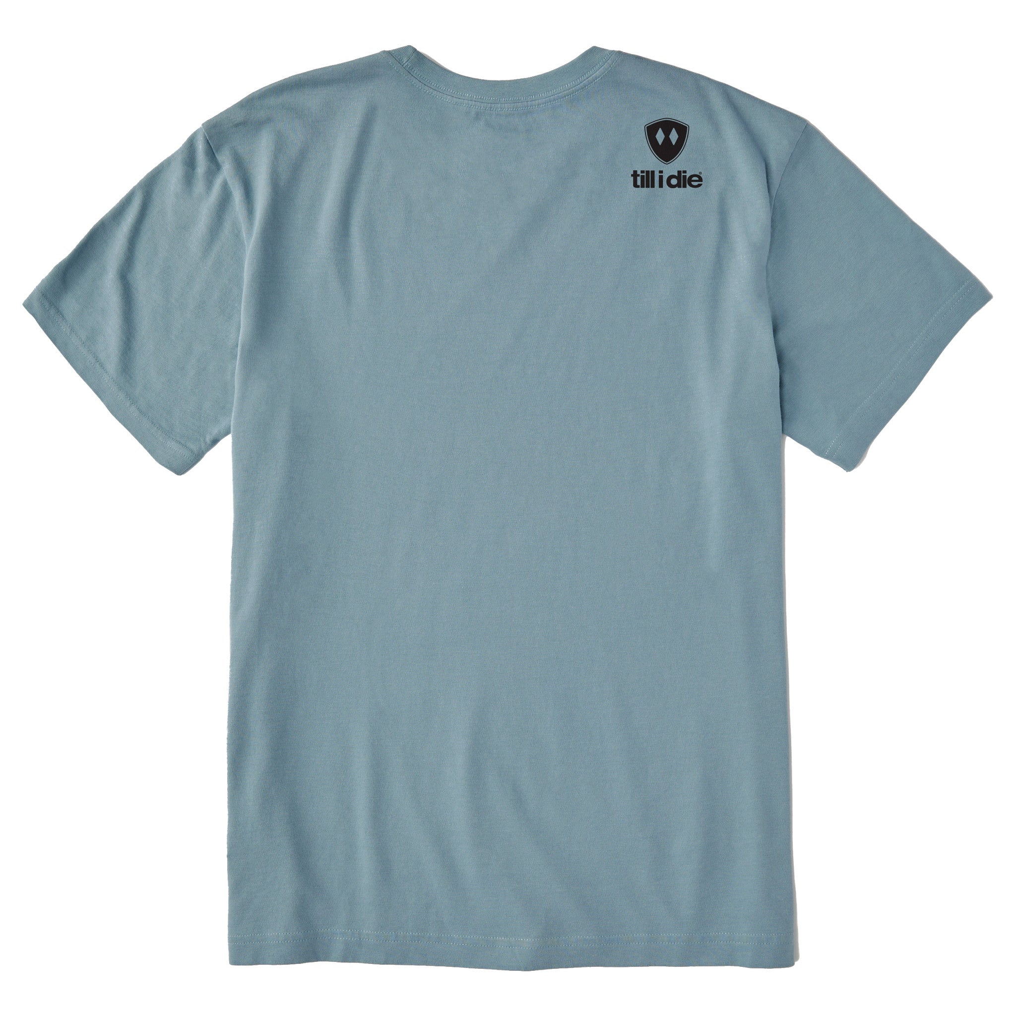 A blue tee shirt shown from the back, featuring the double diamond shield logo and the text 'till i die' on the upper right shoulder, set against a plain white background.