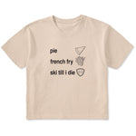 Cream cropped T-shirt featuring black text and hand-drawn icons celebrating three mountain essentials: pie, French fries, and “Ski Till I Die,” finished with the signature Double Diamond shield.