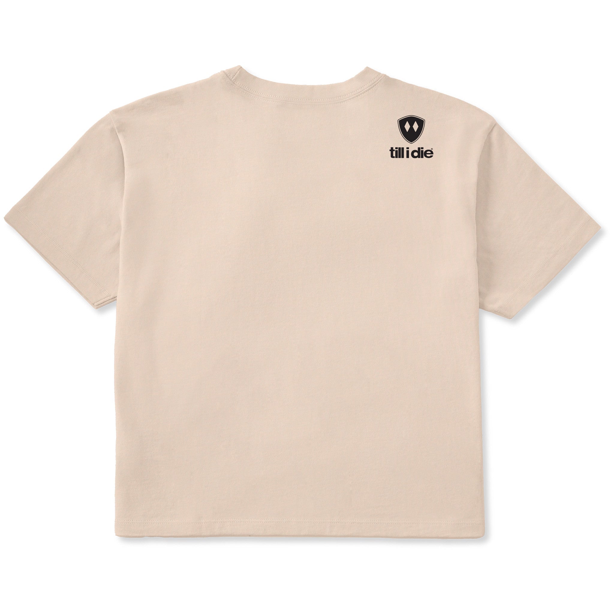 A cream crop tee shirt shown from the back, featuring the double diamond shield logo and the text 'till i die' on the upper right shoulder, set against a plain white background.