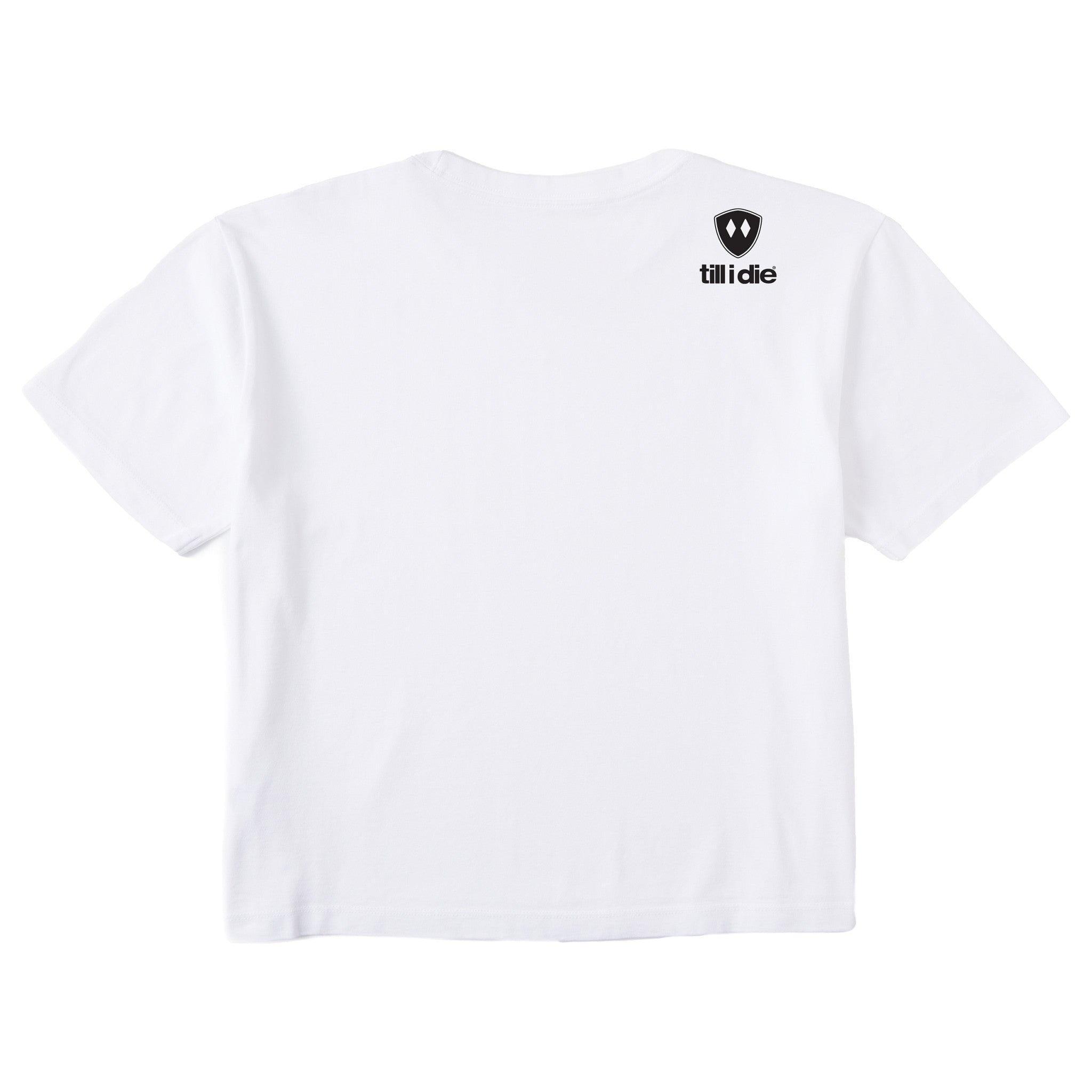 A white crop tee shirt shown from the back, featuring the double diamond shield logo and the text 'till i die' on the upper right shoulder, set against a plain white background.
