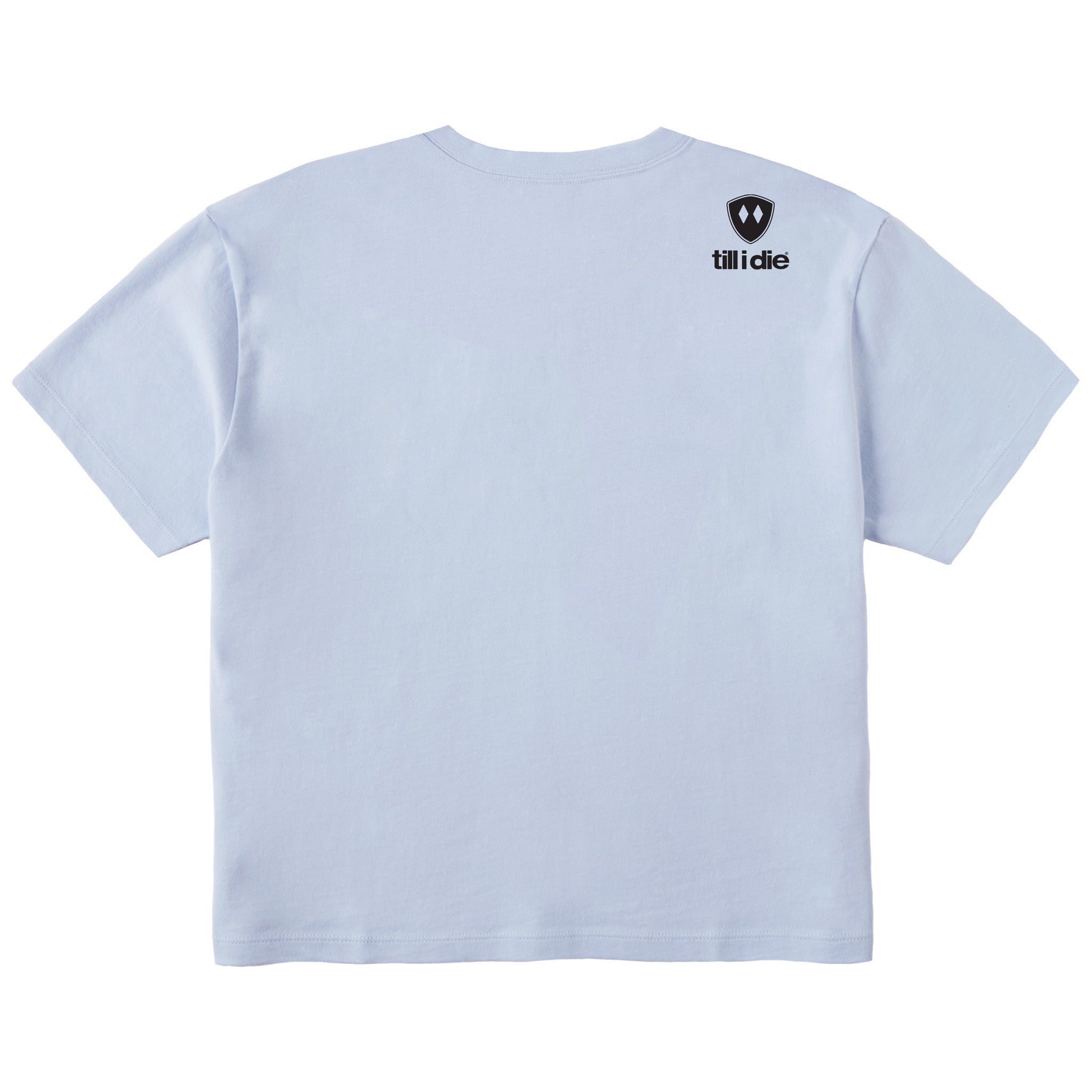 A light blue crop tee shirt shown from the back, featuring the double diamond shield logo and the text 'till i die' on the upper right shoulder, set against a plain white background.