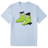 A light blue short-sleeve crewneck t-shirt featuring a graphic print of a pair of lime green retro rear entry ski boots with white, black, and pink details.