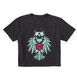 Faded black cropped short sleeve T-shirt featuring a bold teal winged skull wearing sunglasses, finished with a bright pink Double Diamond shield at the center.
