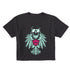 Faded black cropped short sleeve T-shirt featuring a bold teal winged skull wearing sunglasses, finished with a bright pink Double Diamond shield at the center.