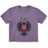 Faded purple cropped short sleeve T-shirt featuring a bold black winged skull wearing sunglasses, finished with a bright pink Double Diamond shield at the center.