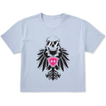 Light blue cropped short sleeve T-shirt featuring a bold black winged skull wearing sunglasses, finished with a bright pink Double Diamond shield at the center.