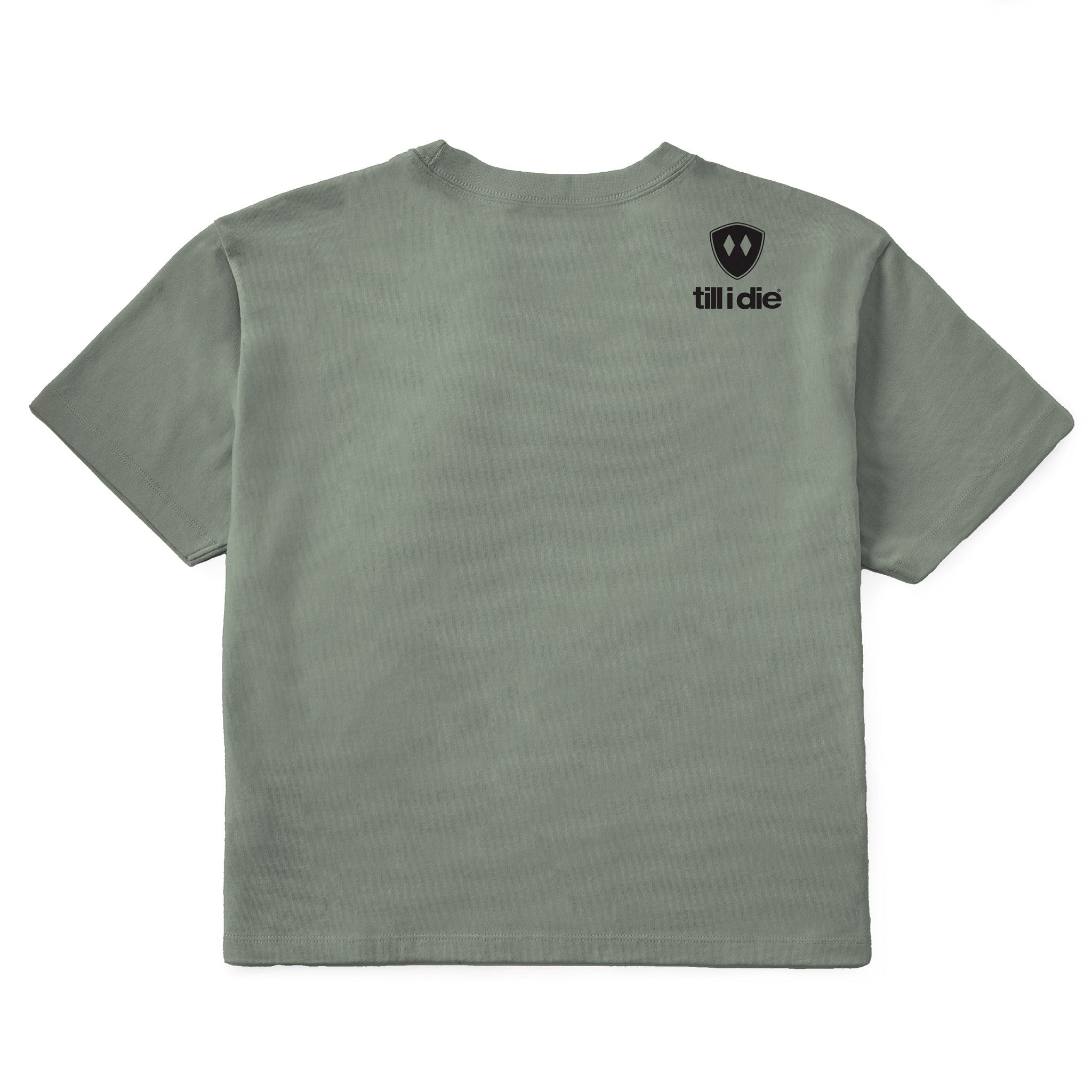 A military green cropped tee shirt shown from the back, featuring the double diamond shield logo and the text 'till i die' on the upper right shoulder, set against a plain white background.