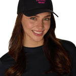 Female model wearing Apr�s Till I Die hat, smiling in a studio setting