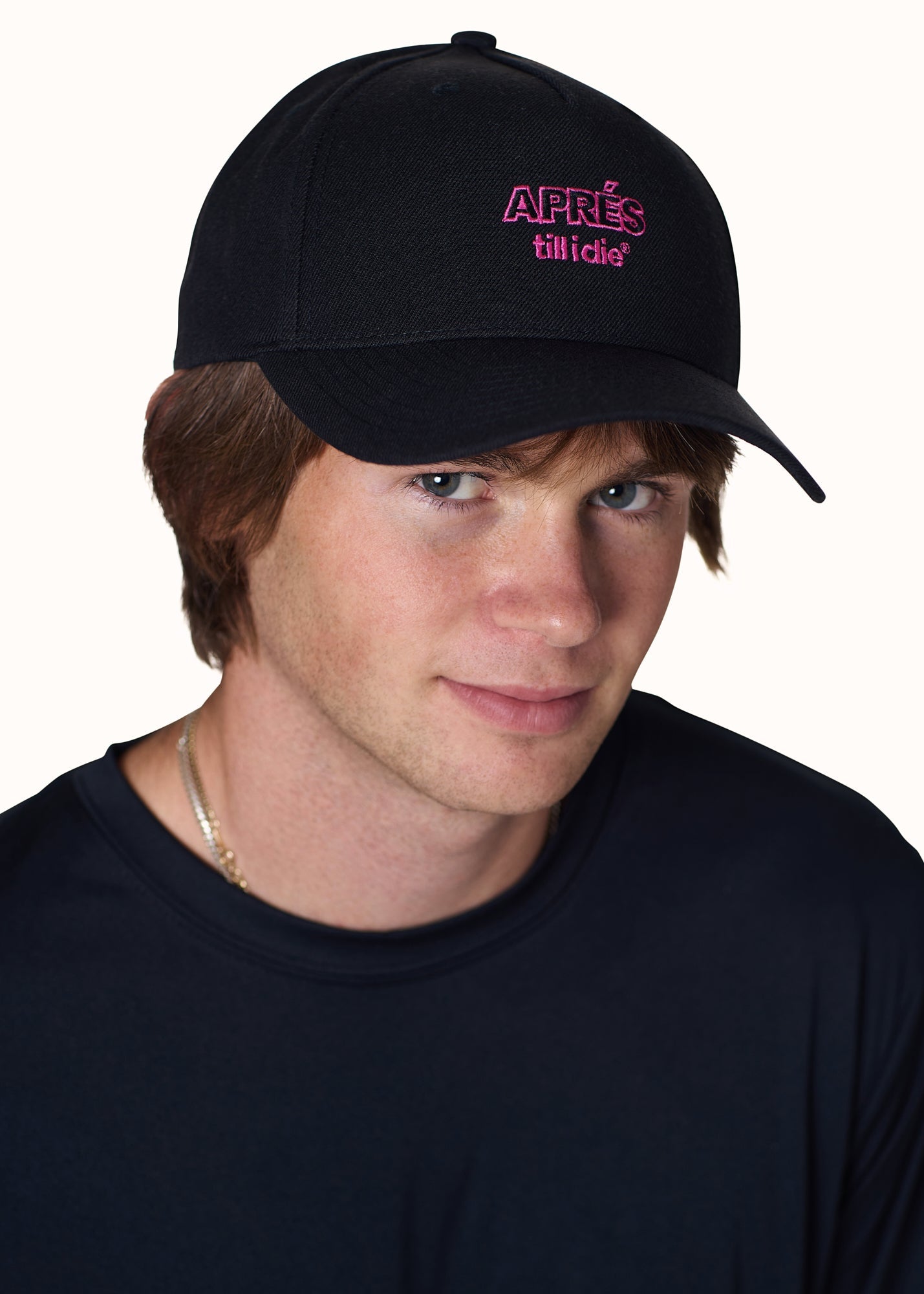 Male model wearing Apr�s Till I Die hat, looking confidently at camera
