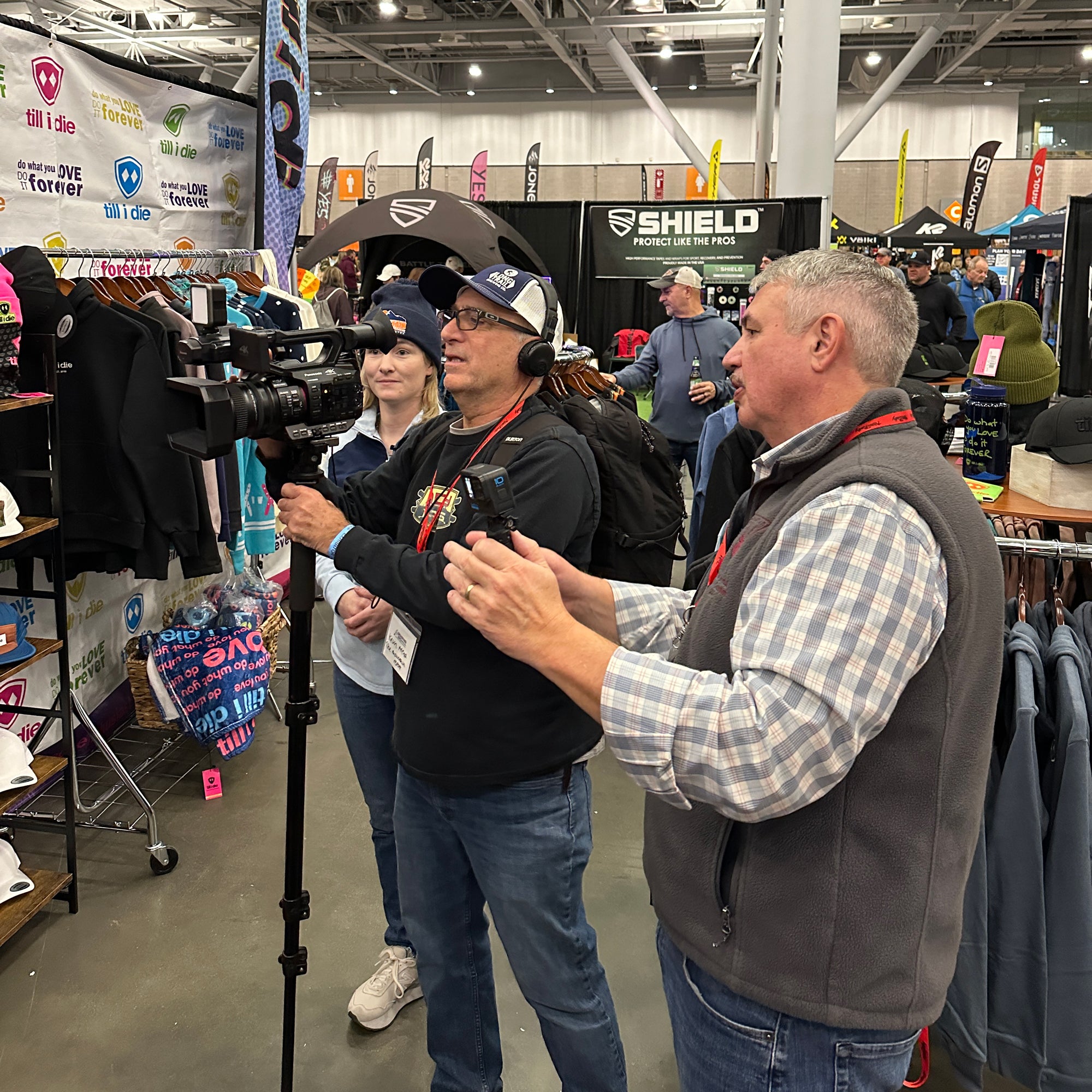 Behind the scene of the mountain report film crew at the Till I die booth during the snowbound Expo