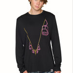 Male model wearing black Chairlift Performance Long Sleeve shirt with pink and orange chairlift graphic by Till I Die