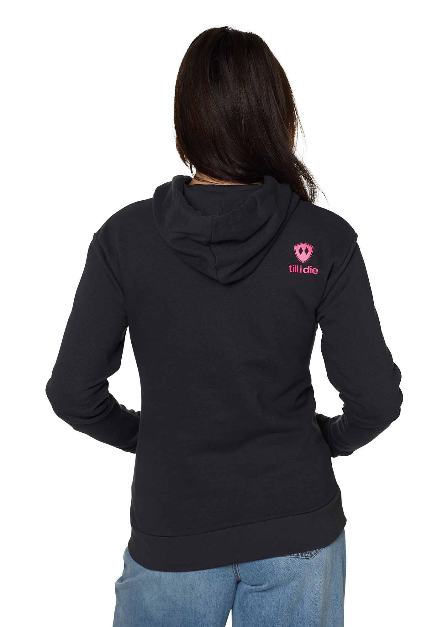 Back view of female model in Till I Die "I'm Difficult" hoodie with hot pink graphic, Winter 2025